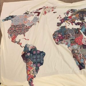 different colored patterned world map tapestry